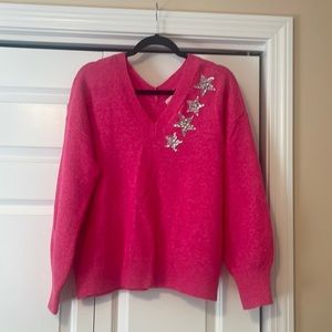 Loft pink sweater with silver sequins stars.